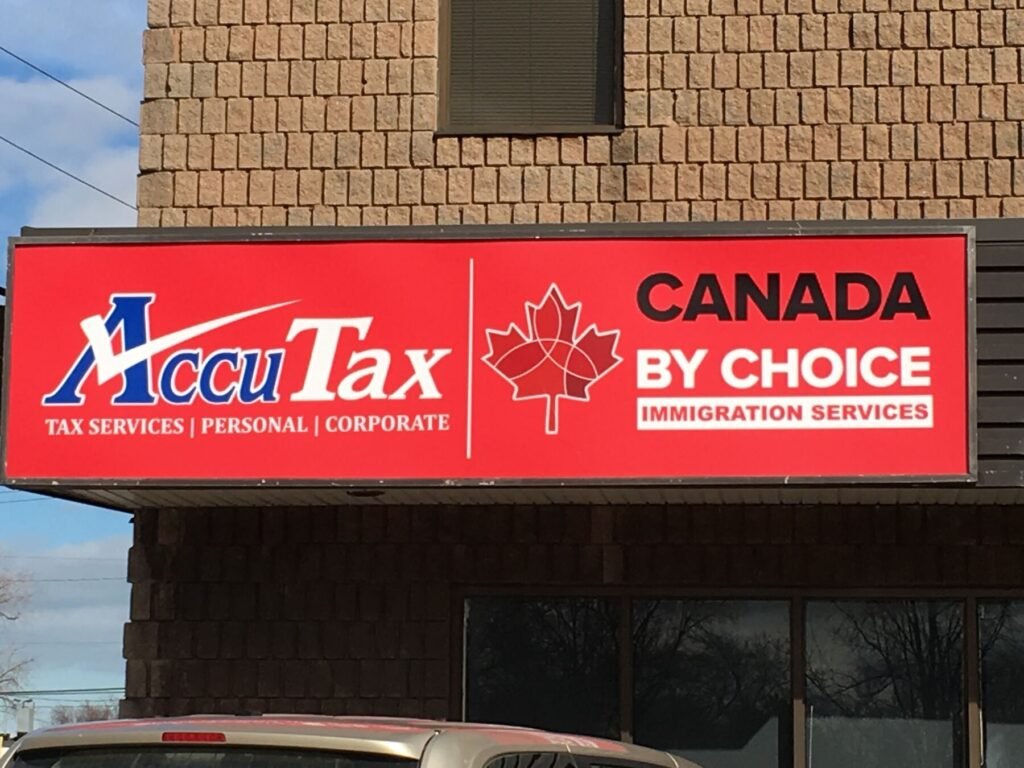 AccuTax & Canada By Choice cabinet sign