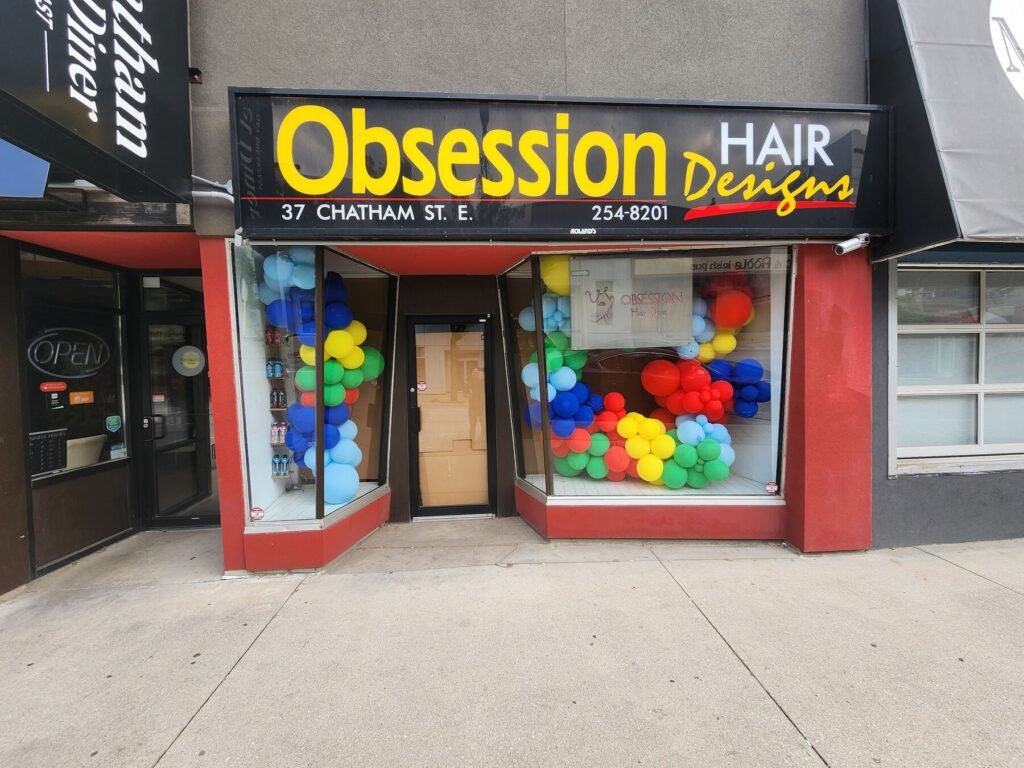 Obsession Hair Designs cabinet sign