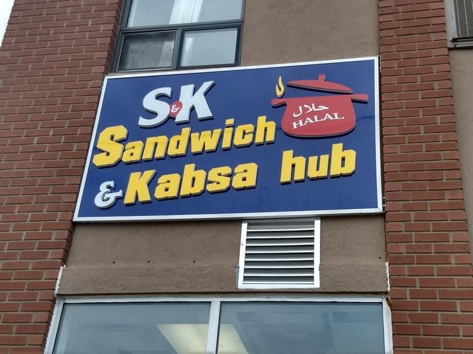 S&K Sandwich & Kabsa Hub cabinet sign