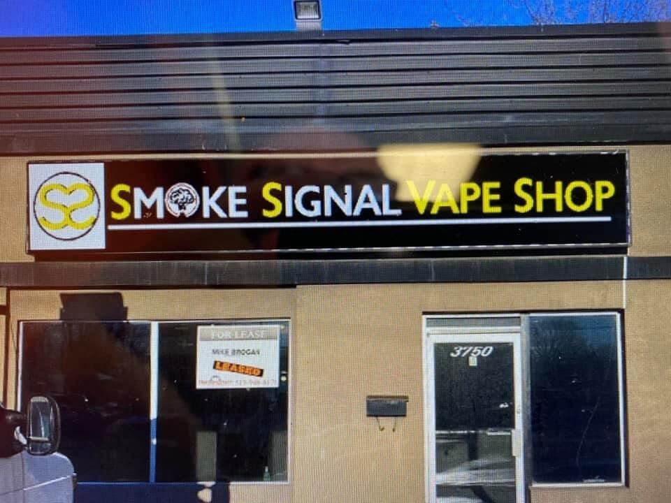 Smoke Signal Vape Shop cabinet sign