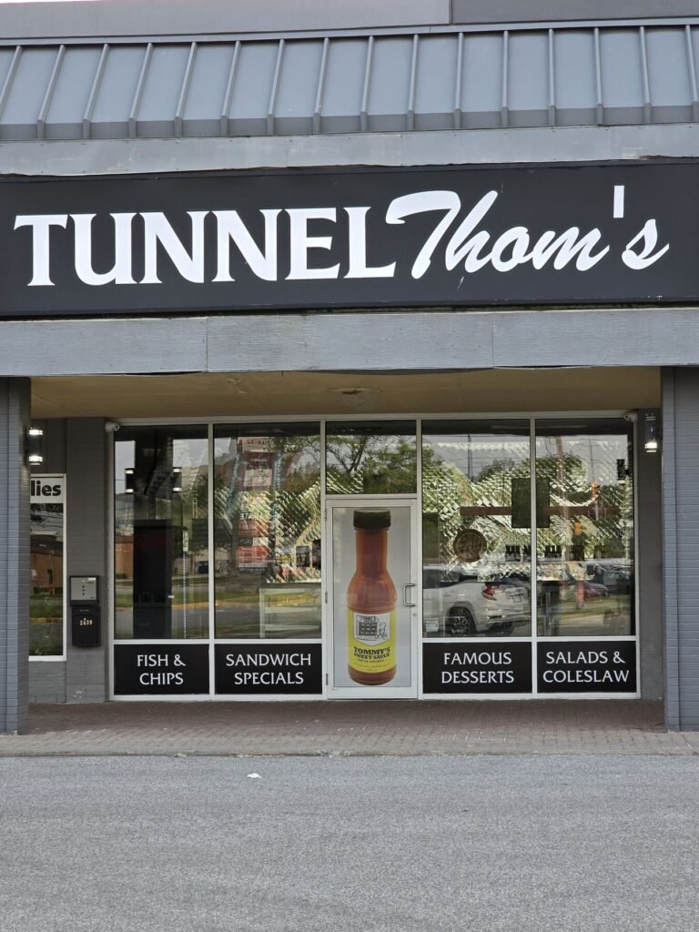 Tunnel Thom's cabinet sign
