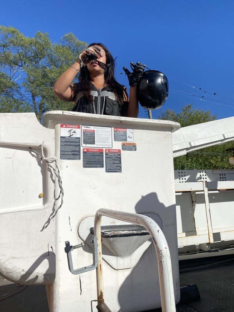 Bucket Truck Crew sign installation