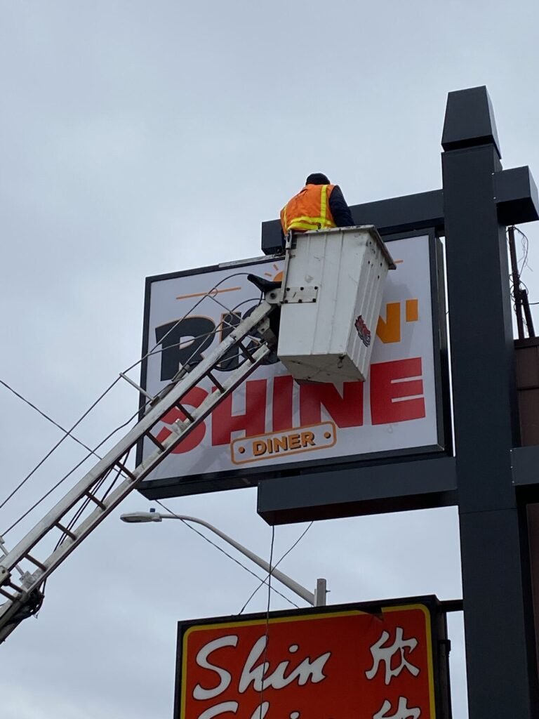 Shine Pylon Sign sign installation