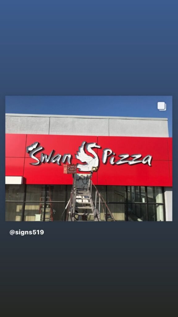 Swan Pizza sign installation