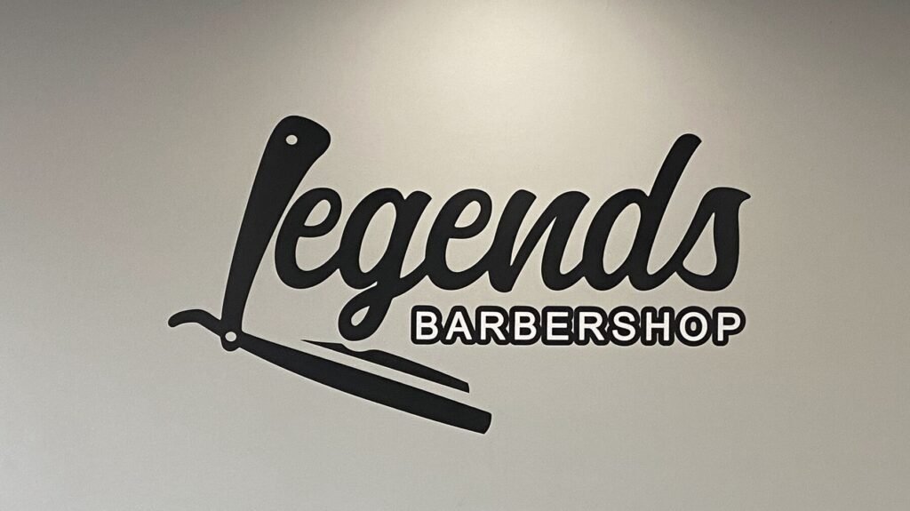 Legends Barbershop interior sign