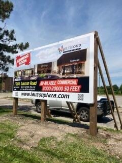 Lauzon Plaza pylon and monument sign