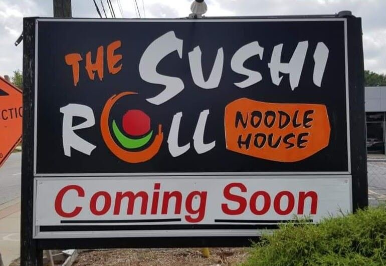 The Sushi Roll Noodle House pylon and monument sign